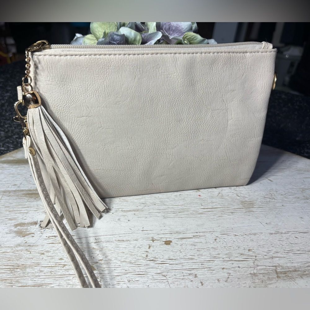 Elegant Cream Tassel Clutch